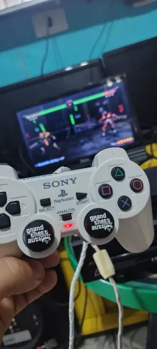 controle original de PS2 funcionando perfeitamente