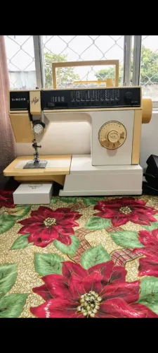 Maquina de costura singer