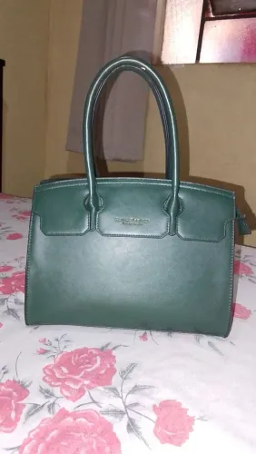 Vende se bolsa nova verde militar .