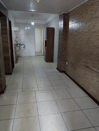 Casa no caminho de areia