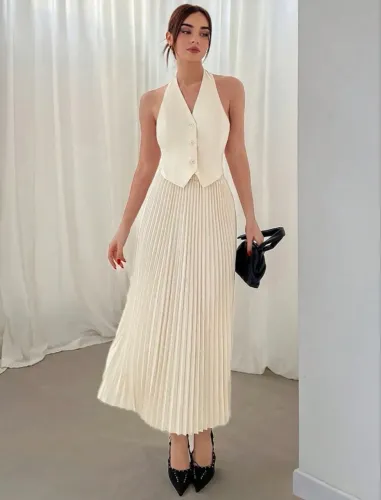 Saia midi plissada off-white - elegante e versátil ?