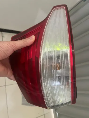 Lanterna Traseira do Fiat Grand Siena lado Esquedo