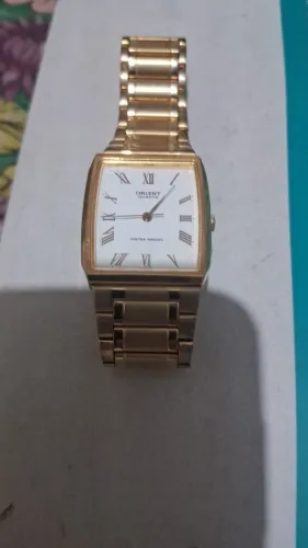 Vendo relógio orient original banhado a ouro! Nada quebrado ou arranhado!só colocar pilha!