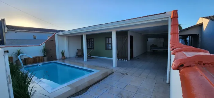 Casa com piscina Guaratuba | Venda ou Permuta por imóvel em Curitiba