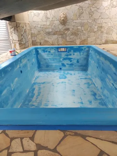 Reforma e pintura de piscinas de fibra