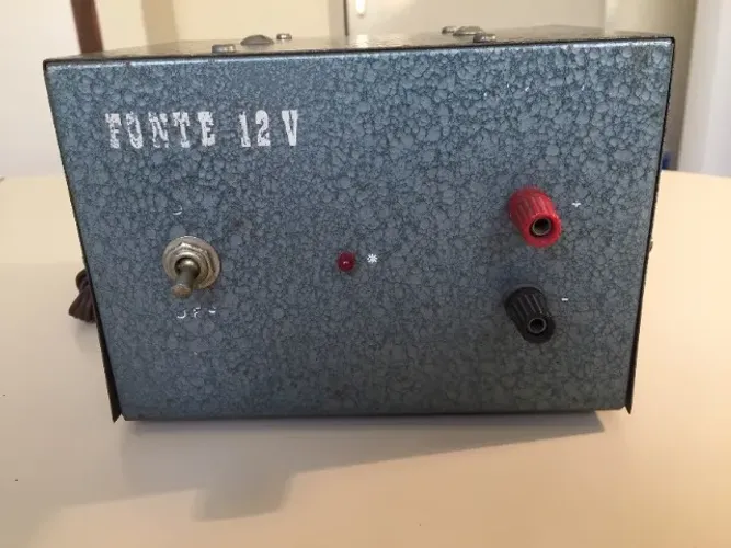 Fonte 12 v - cinza - bivolt - usada 