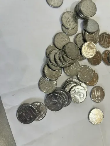 121 moedas de 10 cruzeiros