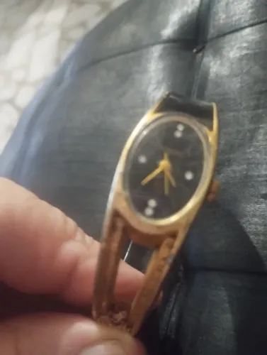 Relogio Porsche, bracelete feminino a corda ,faltando parte de acabamento da pulseira.