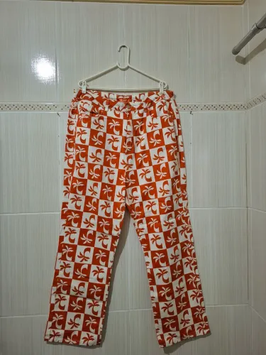 CALÇA COSMOS RIO - LARANJA
