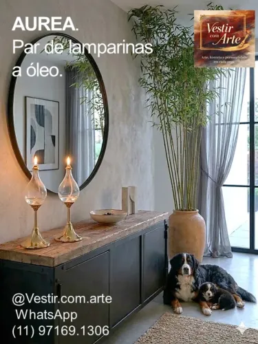 AUREA. Par de lamparinas a óleo.