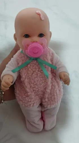 Boneca mini bebê,  em perfeito estado 