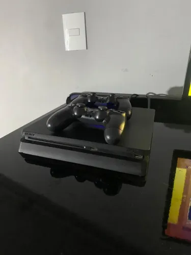 PS4 SLIM ? NOVO