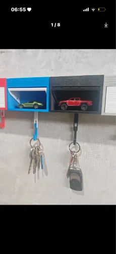 Porta-chaves de garagem (garagem abre conforme pendura a chaves)