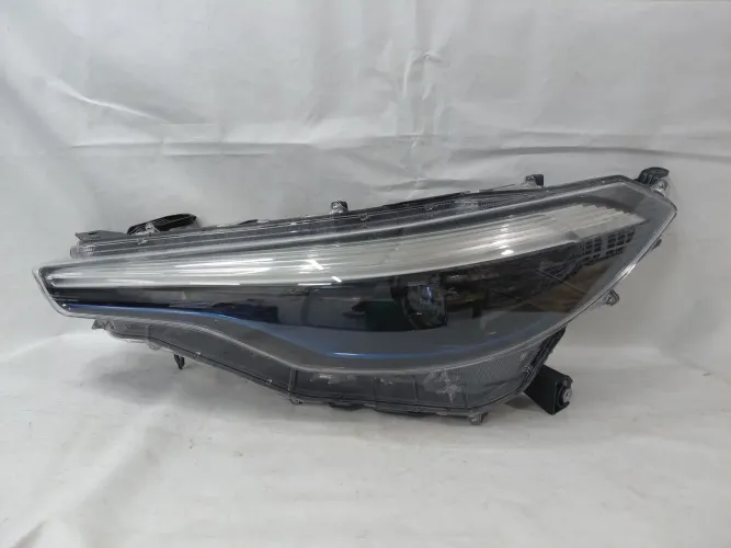 Farol Corolla Cross Híbrido esquerdo 20/25 COM DETALHE 