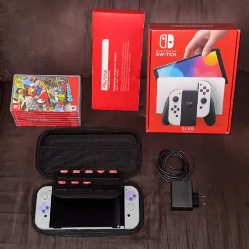 Nintendo Switch OLED + 8 Jogos + Capa/Película/Estojo