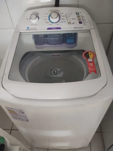 Máquina de lavar com defeito