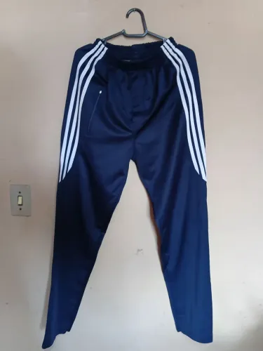 Calça de moletom masculina azul. Agasalho para esportes. Tamanho G. EM BOM ESTADO. LISTRAS