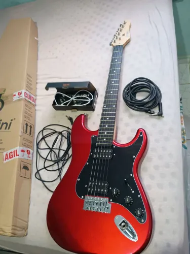 Guitarra giannini G-102 strato Vermelha + cube baby + cabo santo angelo