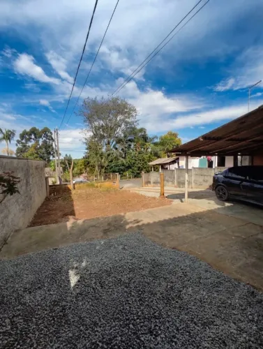 Terreno 200m² com Casa e Renda de Aluguel - Documentação 100% OK