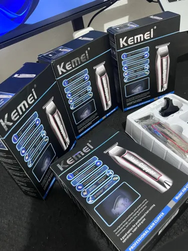 Máquina de cortar cabelo KEMEI ?