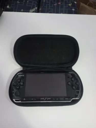 PSP Bloqueado Acompanha cartão com Jogos já