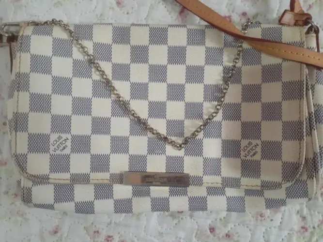 Bolsa LV usada e com avarias. Não baixo valor, leia com atenção!