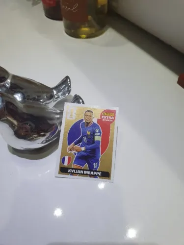 Figurinha mbappe extra gold 2026