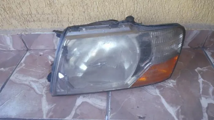 Lente do farol esquerdo mitsubishi pajero full 2000 2001