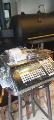 Balança com etiqueta Prix 