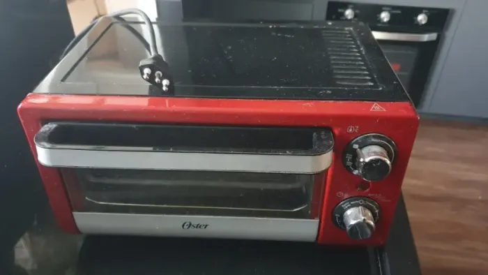 Forno Tostador Oster TSSTTV10LTR-017 (127V, 1050W).