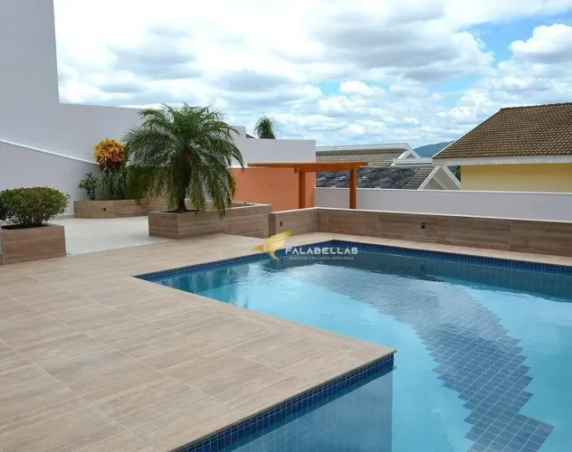 Casa com 3 dormitórios à venda, 340 m² por R$ 2.300.000,00 - Condomínio Portal do Paraíso