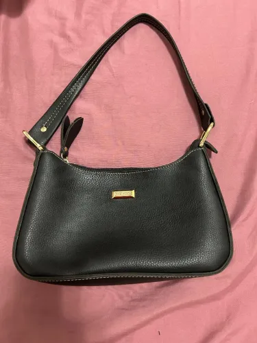 Bolsas couro fino + Santa Lola 