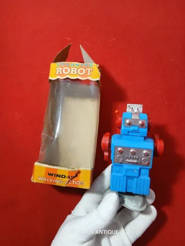 Robô de lata, a corda, anos 80's,  japonês. 