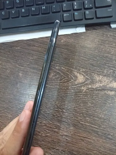 Celular com a bateria ? inchada mais aguenta um dia na Marra te perfeita traseira trincad