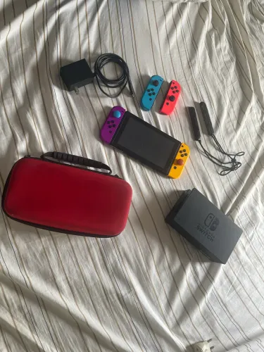 Nintendo Switch  / 4 controles originais / aceito troca por celular mais $ 