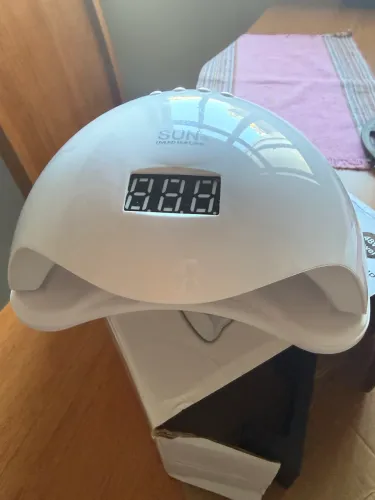 Cabine UV e lixadeira elétrica
