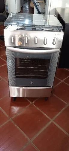 Fogão GE de 4 bocas semi novo em inox com acendimento automático