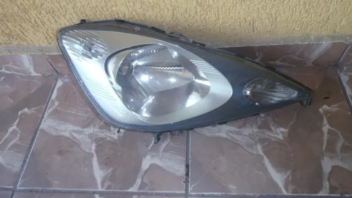 Lente do farol direita Honda new fit