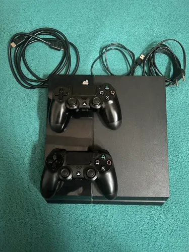 PS4 500 GB + 10 Jogos Físicos