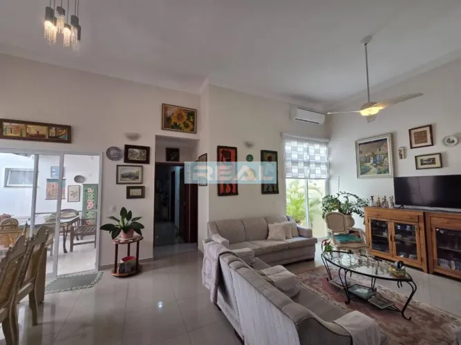 Casa com 3 dormitórios à venda, 164 m² por R$ 920.000,00 - Condomínio Campos do Conde I -