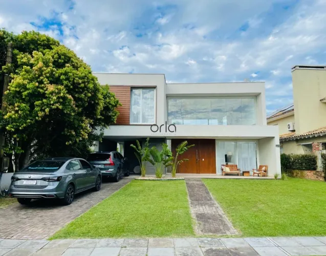 Casa mobiliada com 4 suítes e piscina à venda, 321 m² - Condomínio Porto Coronado - Xangri