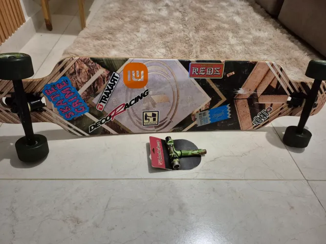 Longboard Traxart com rolamento Bones Reds