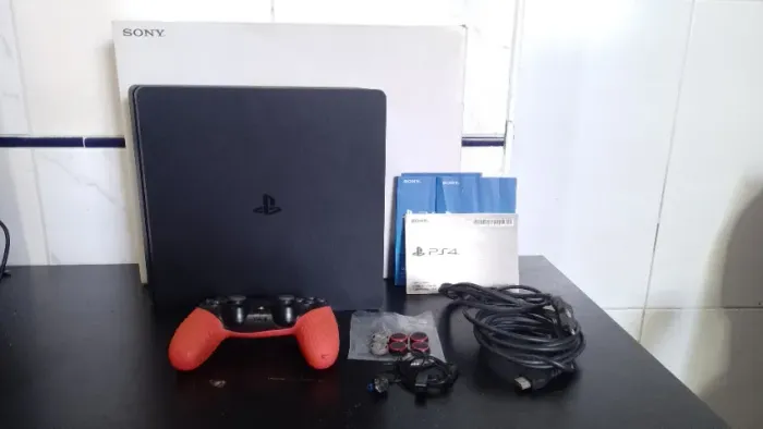 PS4 (1 Tera de HD) com caixa e manuais, firmware 11.50