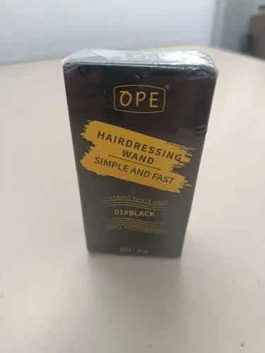 Bastão para retoque de tintura para cabelos brancos da marca OPE. Na cor preta