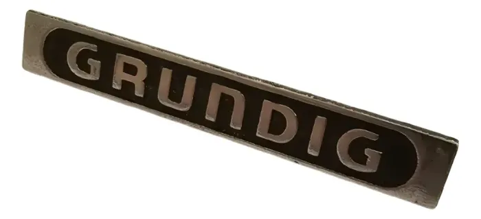 BSV260003 Emblema Grundig Logotipo Metal Original Som Radio 55 X 8mm