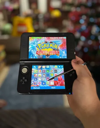Nintendo 3ds Xl com caixa e manual e muitos jogos como Pokémon Mario e zelda