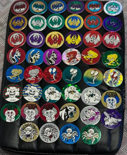coleção tazos milk caps monstros