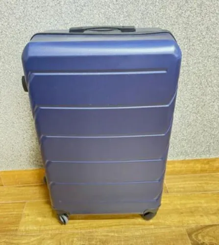 Mala de viagem azul resistente e espaçosa