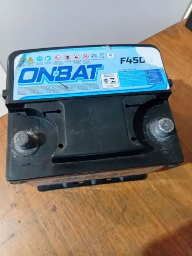 Bateria 45ah onbat lado direito