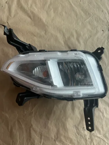 Farol milha lado esquerdo